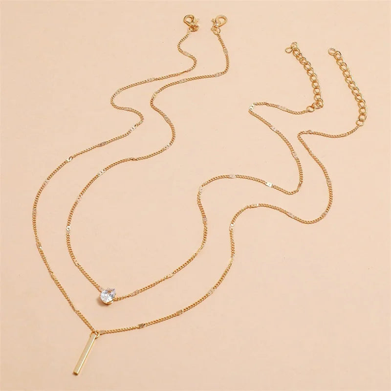 Collier bohème pour femme : collier à pendentif multicouche avec breloque en strass 2024